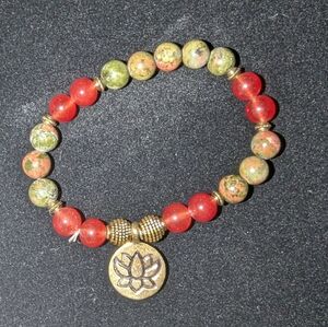 Lotus charm nracelet